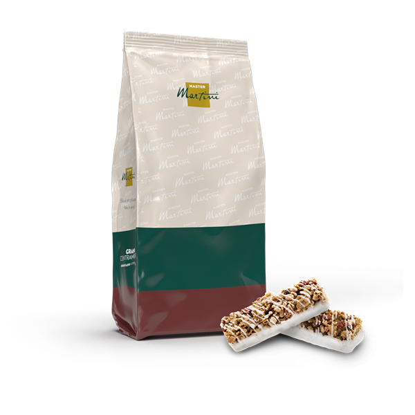 Bolsa Master Martini con etiqueta verde y roja junto a dos barras de granola con chocolate blanco.