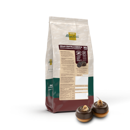 Bolsa de discos de chocolate negro Master Martini Gran Centramerica (18% cacao) junto a dos postres glaseados con cho...